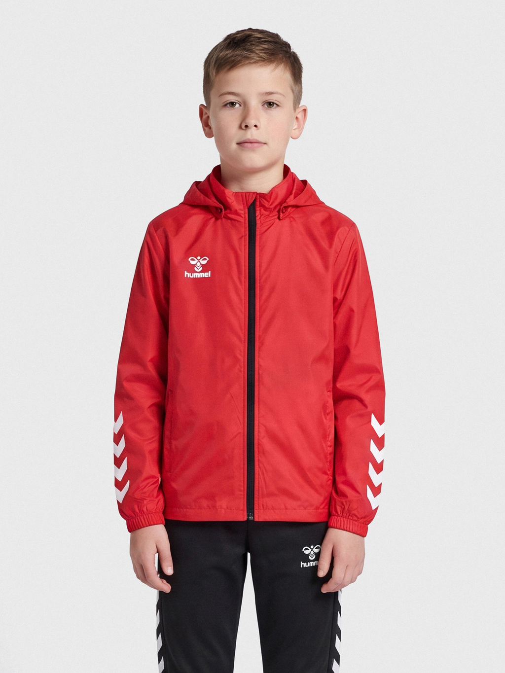 hmlCORE XK SPRAY JACKET KIDS